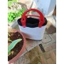 borsa con manici rossi