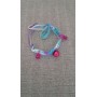Bracciale artigianale colorato con charms rosa