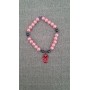 Bracciale artigianale rosa con ciondolo gufo